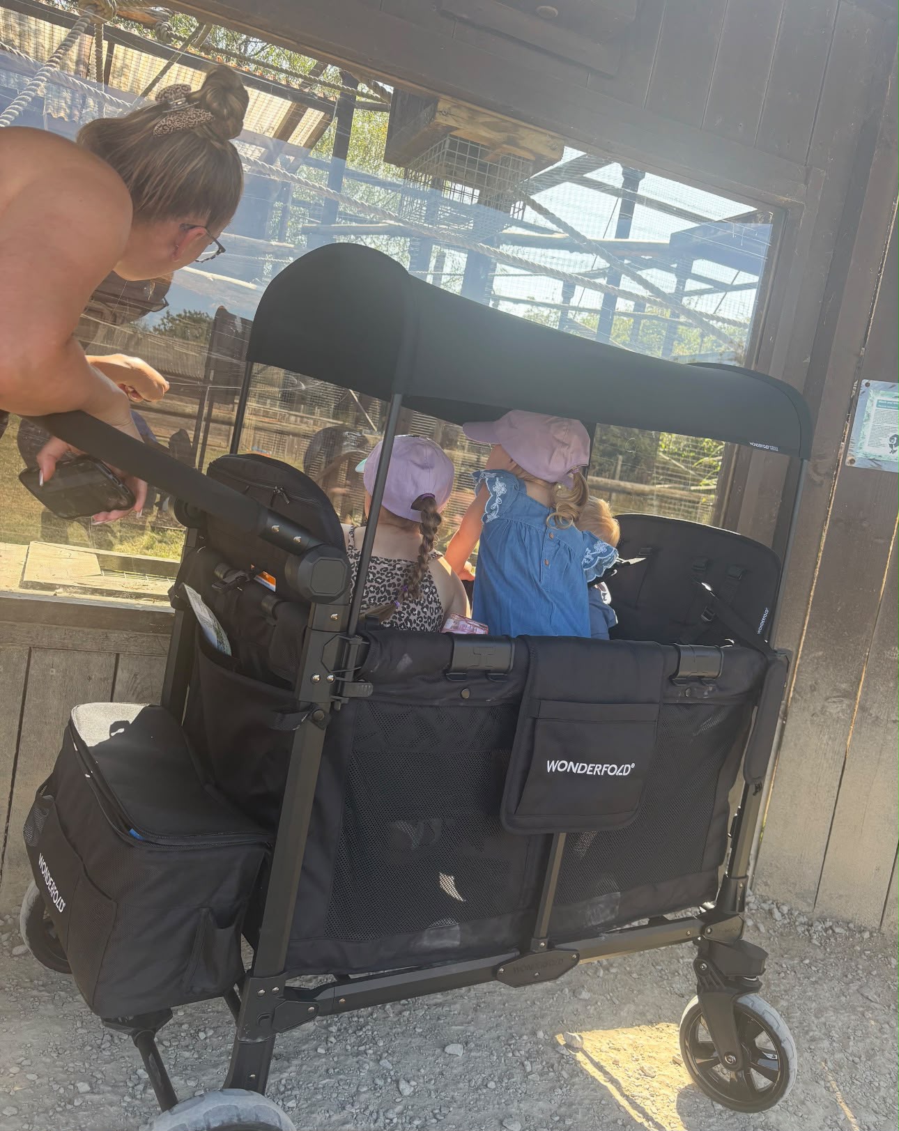 WonderFold wagon loaded with children and bags at the zoo