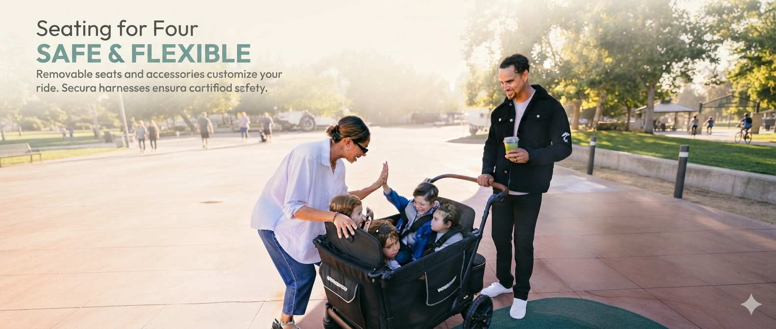 Family with four children in a WonderFold wagon, parents giving high-fives in sunny park